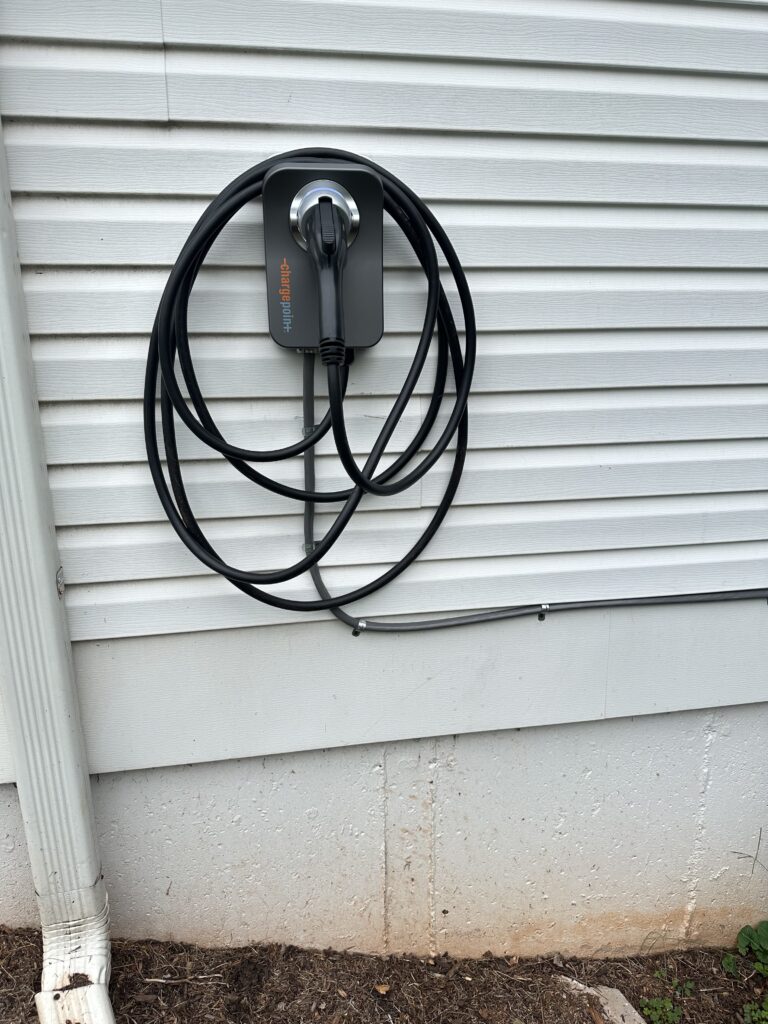 Outdoor ChargePoint EV charger installation by SparkWise Electric