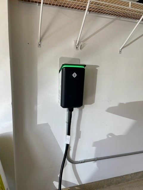 Rivian EV charger indoor hardwired EMT conduit installation by SparkWise Electric