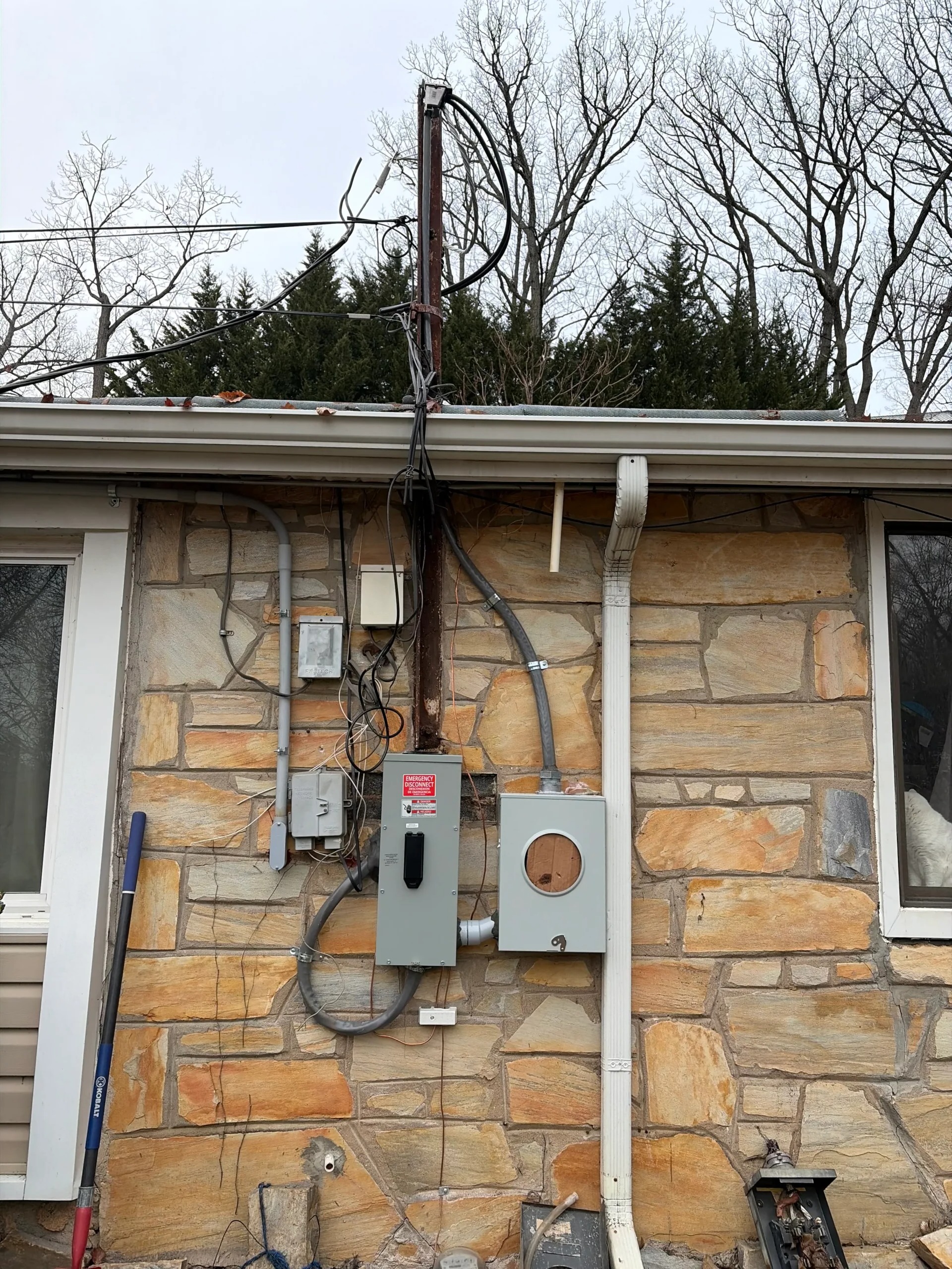 SparkWise Electric technician performing a home electrical safety inspection in Northern Virginia
