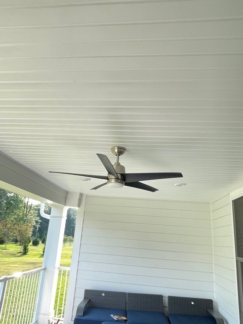 Outdoor ceiling fan installed by SparkWise Electric on a covered porch in Northern Virginia