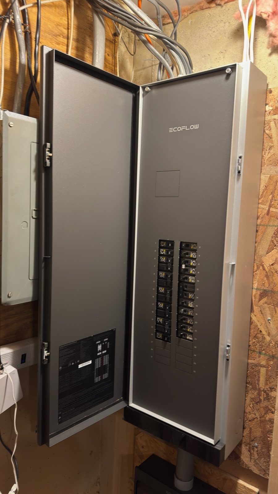 EcoFlow Smart Home Panel with door open showing installed circuit breakers - SparkWise Electric, Northern Virginia