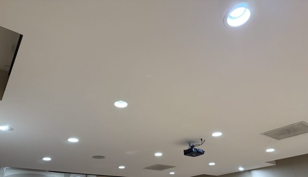Conference room LED recessed lighting retrofit in Washington DC by SparkWise Electric