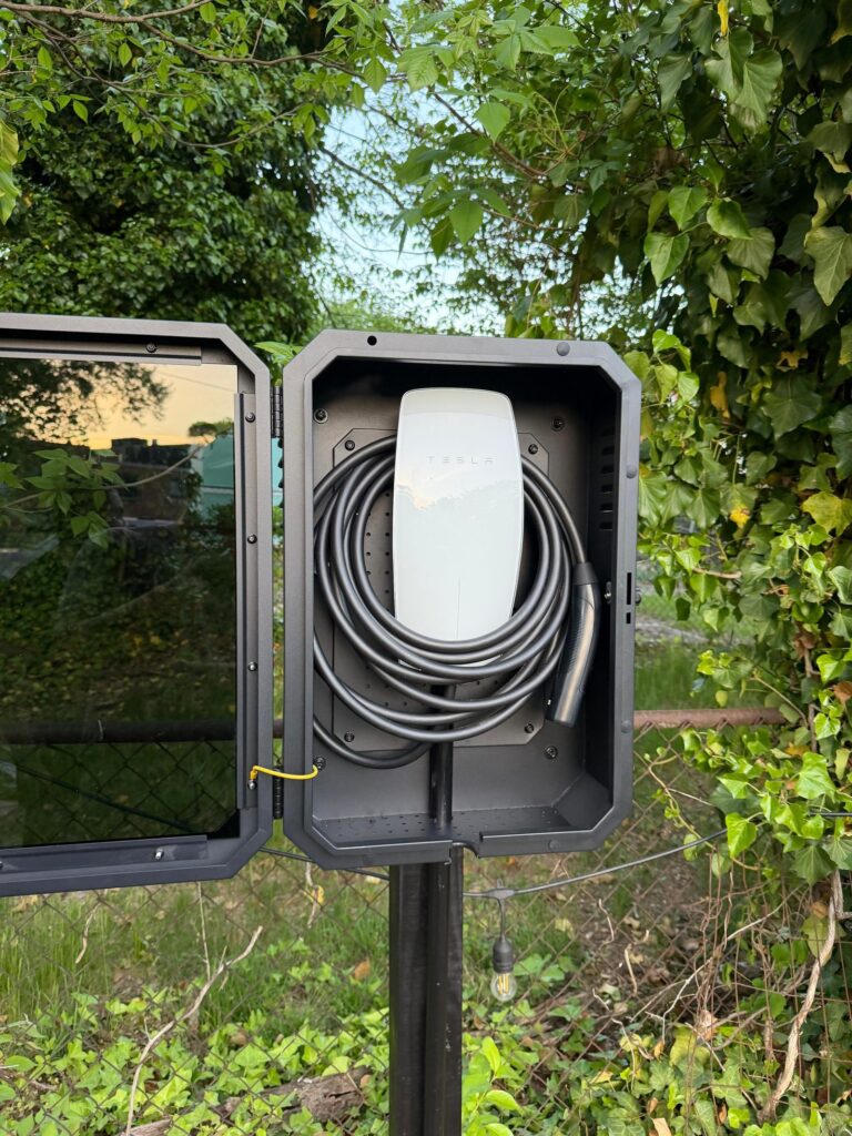 Tesla Wall Connector in lockable weatherproof pedestal enclosure installed in Washington DC