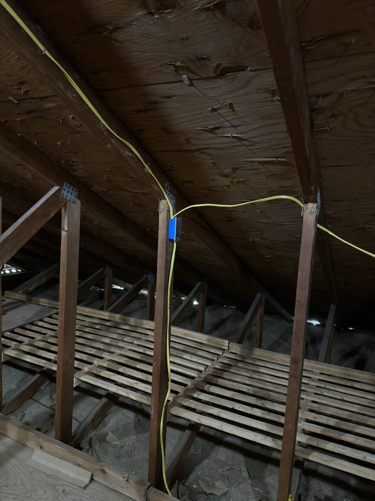 New 12/2 Romex circuit run through attic framing by SparkWise Electric in Annandale VA