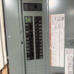 Panel surge protector and labeled circuit directory in a Square D panel installed by SparkWise Electric in Fairfax VA