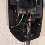 Wiring inside a Lucid home EV charger during installation by SparkWise Electric in Gainesville VA