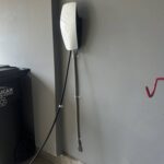 Tesla Wall Connector installed in a Gainesville VA garage by SparkWise Electric