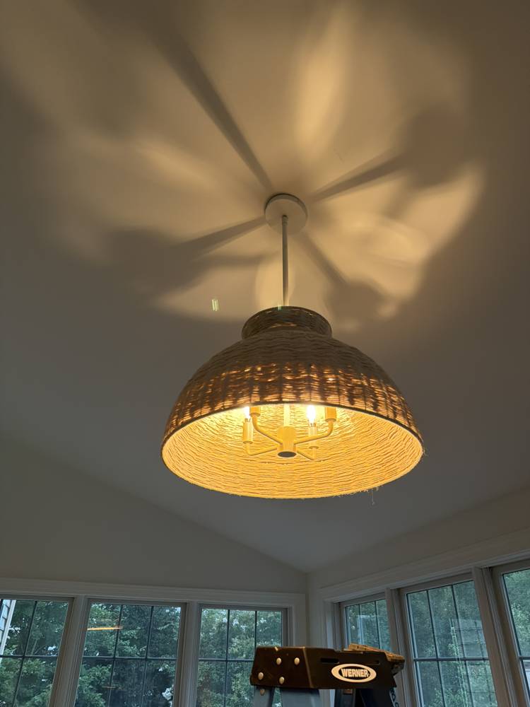 Woven pendant light installed in a vaulted sunroom by SparkWise Electric in Haymarket VA