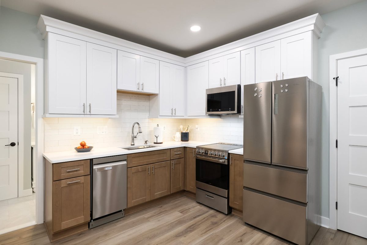 Kitchen with recessed ceiling lighting and under-cabinet lighting installed by SparkWise Electric
