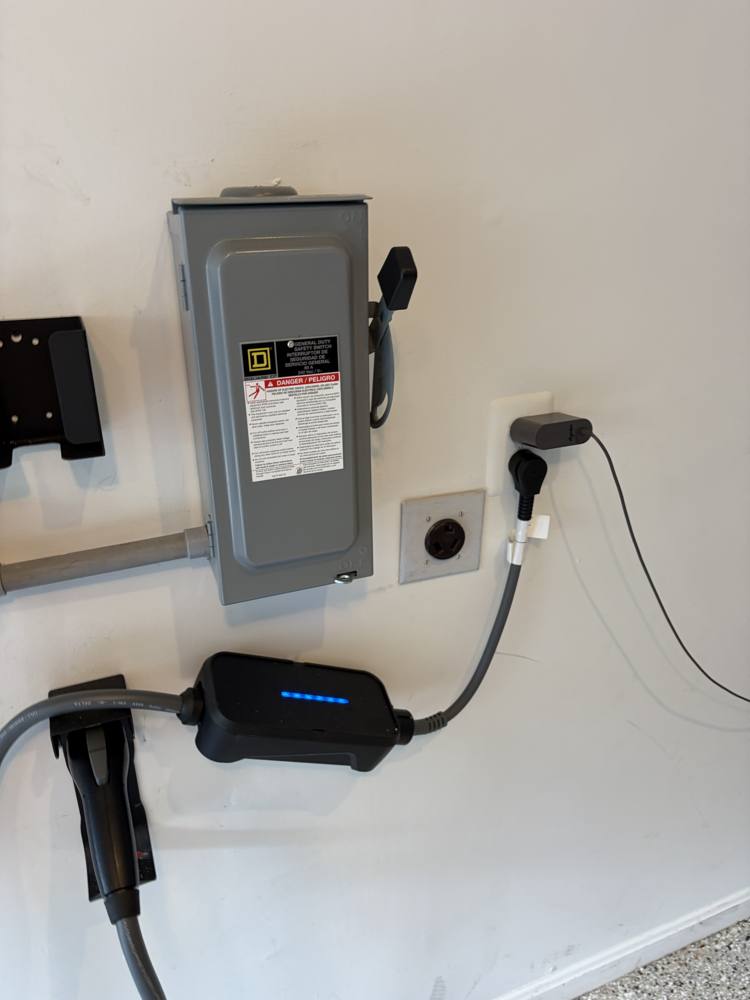EV charger on a fused disconnect and NEMA 14-50 outlet installed by SparkWise Electric in Lorton VA