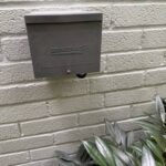 Generac generator inlet box installed on brick by SparkWise Electric in McLean VA