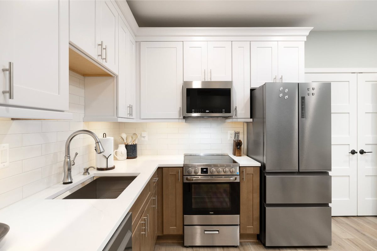 Kitchen with under-cabinet lighting installed by SparkWise Electric