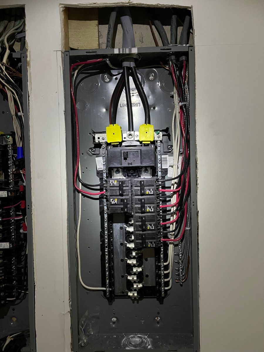 Square D QO panel with the double-pole breakers feeding an electric tankless water heater, Great Falls, VA – SparkWise Electric